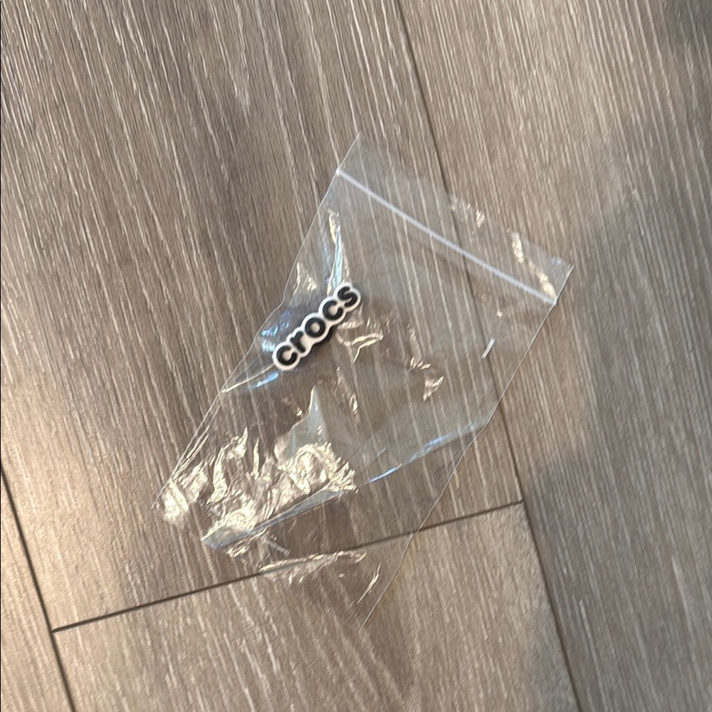 Crocs Black and White Logo Charm